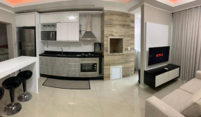 BT204 - Praia Brava, 2 Quartos Sendo 1 Suíte, Ambos com Ar Condicionado, Churrasqueira, Garagem e Internet Rápida